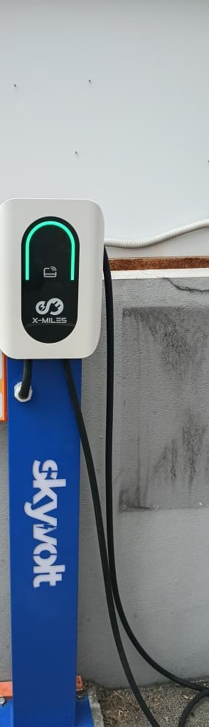 SkyVolt-branded wall-mounted EV charger installed at a residential site